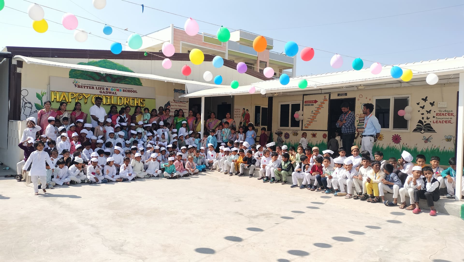 Students and staff celebrating Happy Children's Day